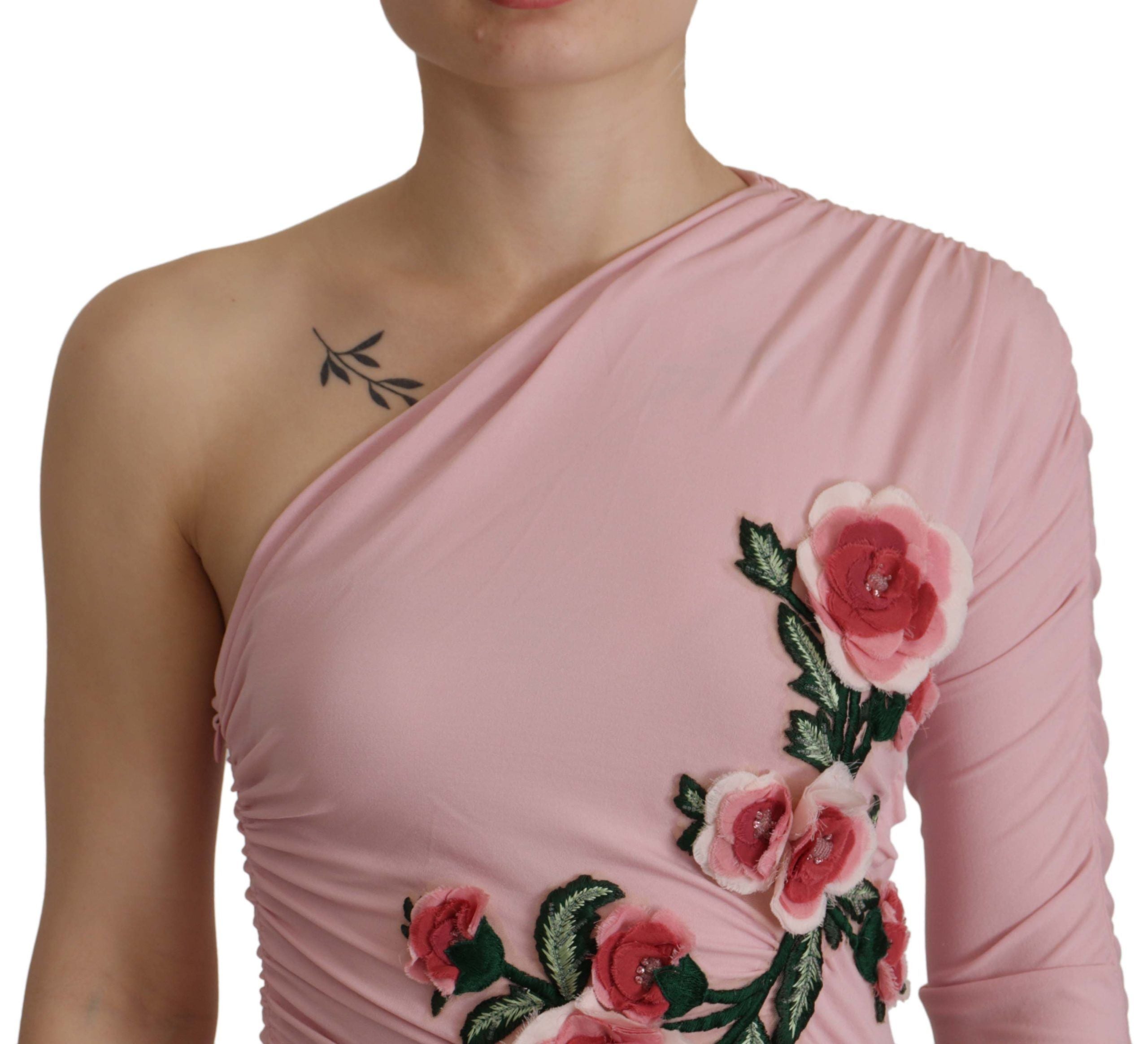 Pink flower-embellished one-shoulder dress by Dolce & Gabbana, featuring floral details and elegant design.