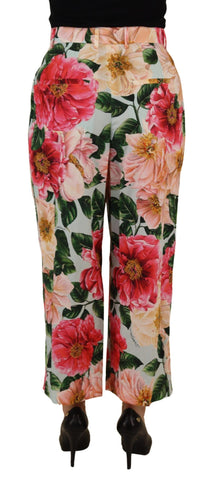 Multicolor flora printed high waist cropped trouser pants by Dolce & Gabbana, featuring vibrant floral design and tailored fit.