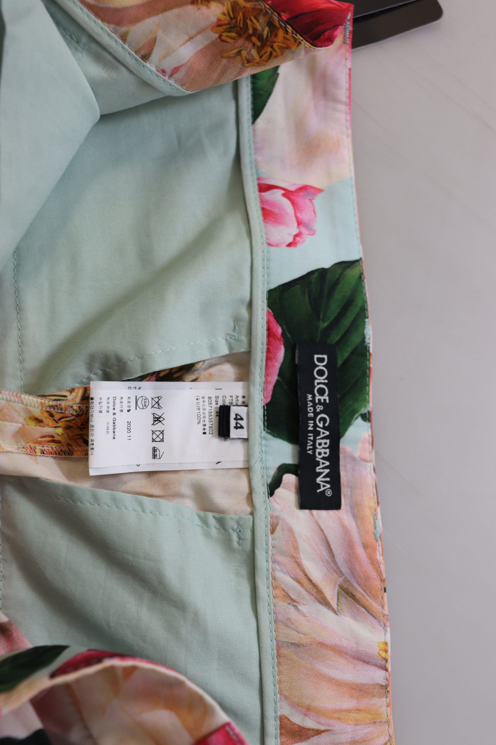 Multicolor floral printed high waist cropped trouser pants by Dolce & Gabbana, featuring vibrant floral patterns and a tailored fit.