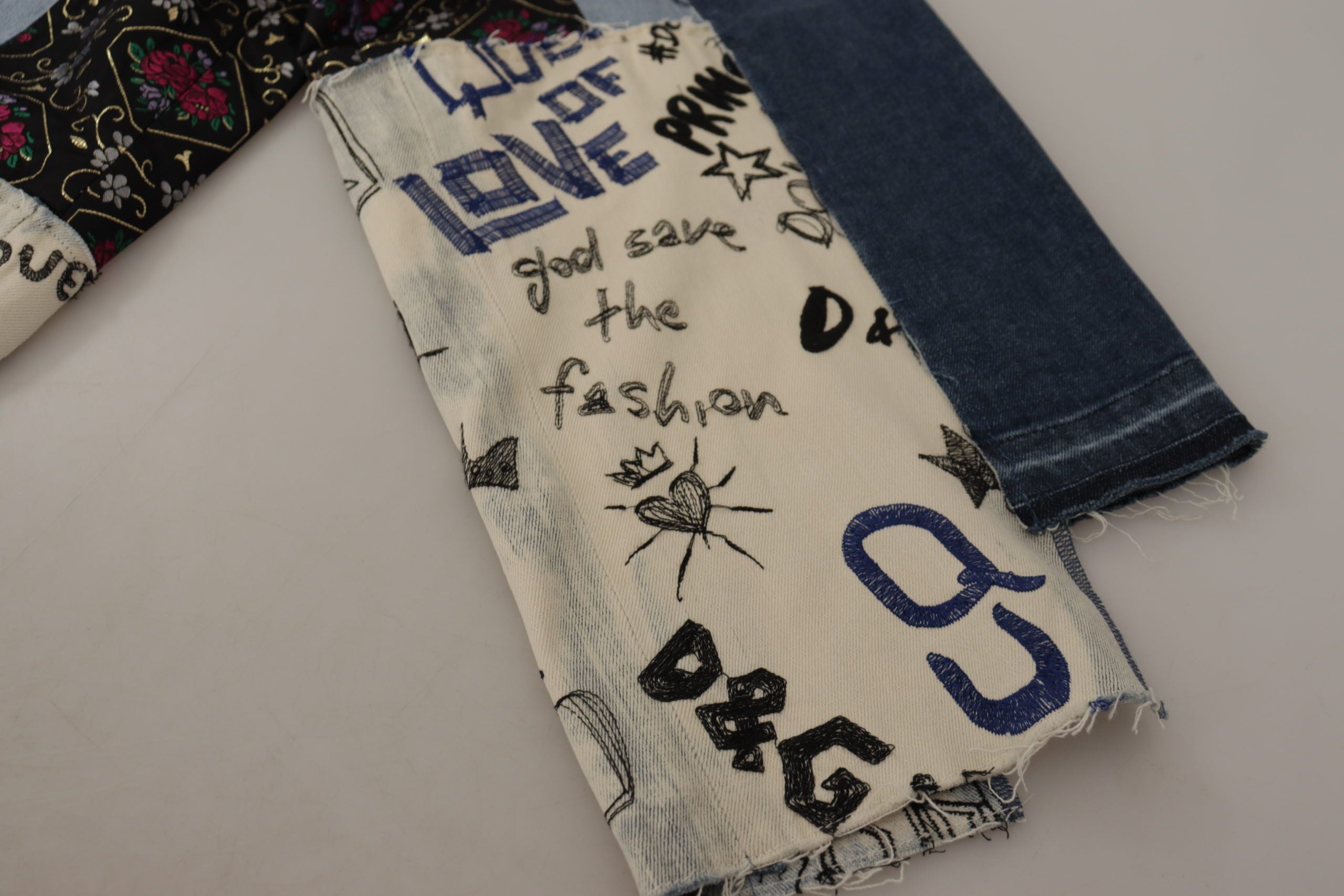 Multicolor patchwork wide-leg denim pants by Dolce & Gabbana with vibrant, mixed fabric design and relaxed fit.