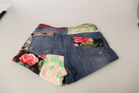 Blue patchwork high waist denim jeans by Dolce & Gabbana with stylish stitching and a fitted silhouette.