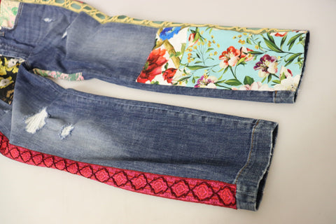 Blue patchwork high waist denim jeans by Dolce & Gabbana, featuring a stylish design and classic fit.