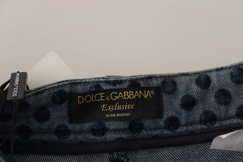 Blue floral high waist skinny denim jeans by Dolce & Gabbana, showing detailed floral print and fitted high-rise design.