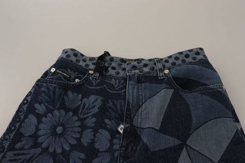 Blue floral high waist skinny denim jeans by Dolce & Gabbana, showing a close-up of the floral pattern and high-rise fit.