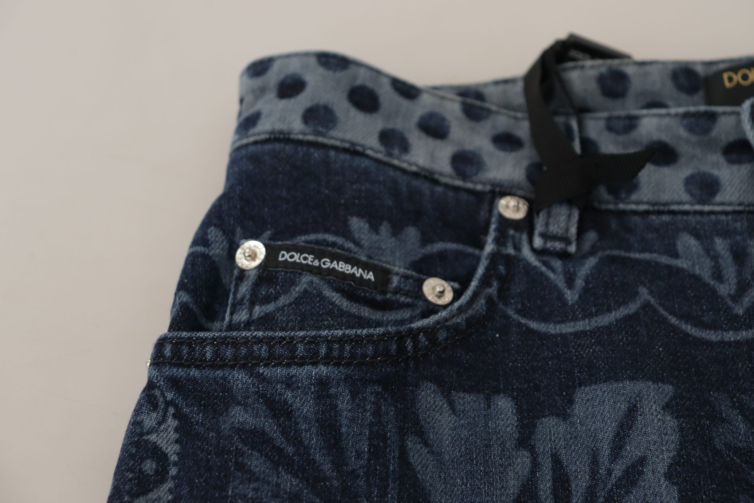 Blue floral high waist skinny denim jeans by Dolce & Gabbana, featuring a fitted silhouette and floral print design.