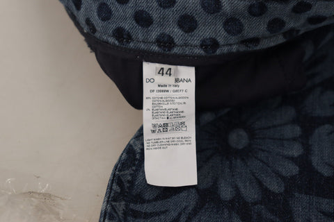 Blue floral high-waist skinny denim jeans by Dolce & Gabbana, showing detailed floral pattern and fitted silhouette.