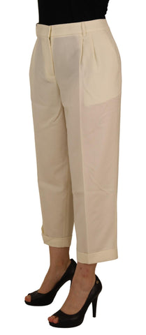 Ivory high waist cropped trousers with folded hem by Dolce & Gabbana, styled for a chic, modern look.