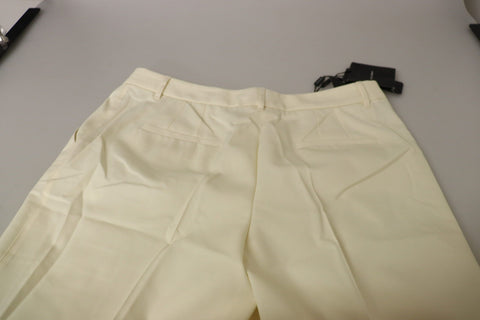 Ivory high waist cropped trousers with folded hem by Dolce & Gabbana, showcasing a stylish and tailored design.