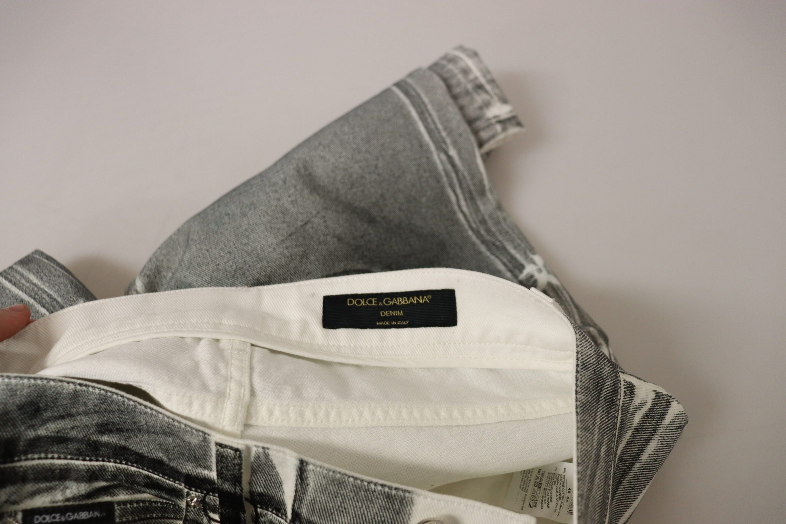 Grey washed high waist denim pants by Dolce & Gabbana, cotton jeans with a fitted style and classic five-pocket design.