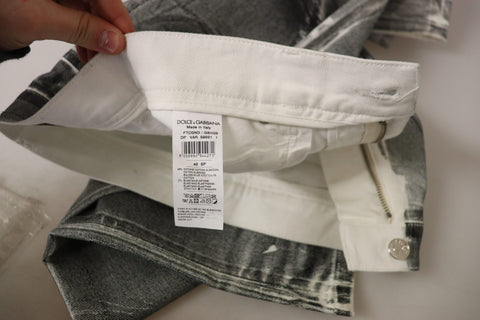 Grey washed high waist denim jeans by Dolce & Gabbana, cotton fabric, classic five-pocket style, shown on a model.