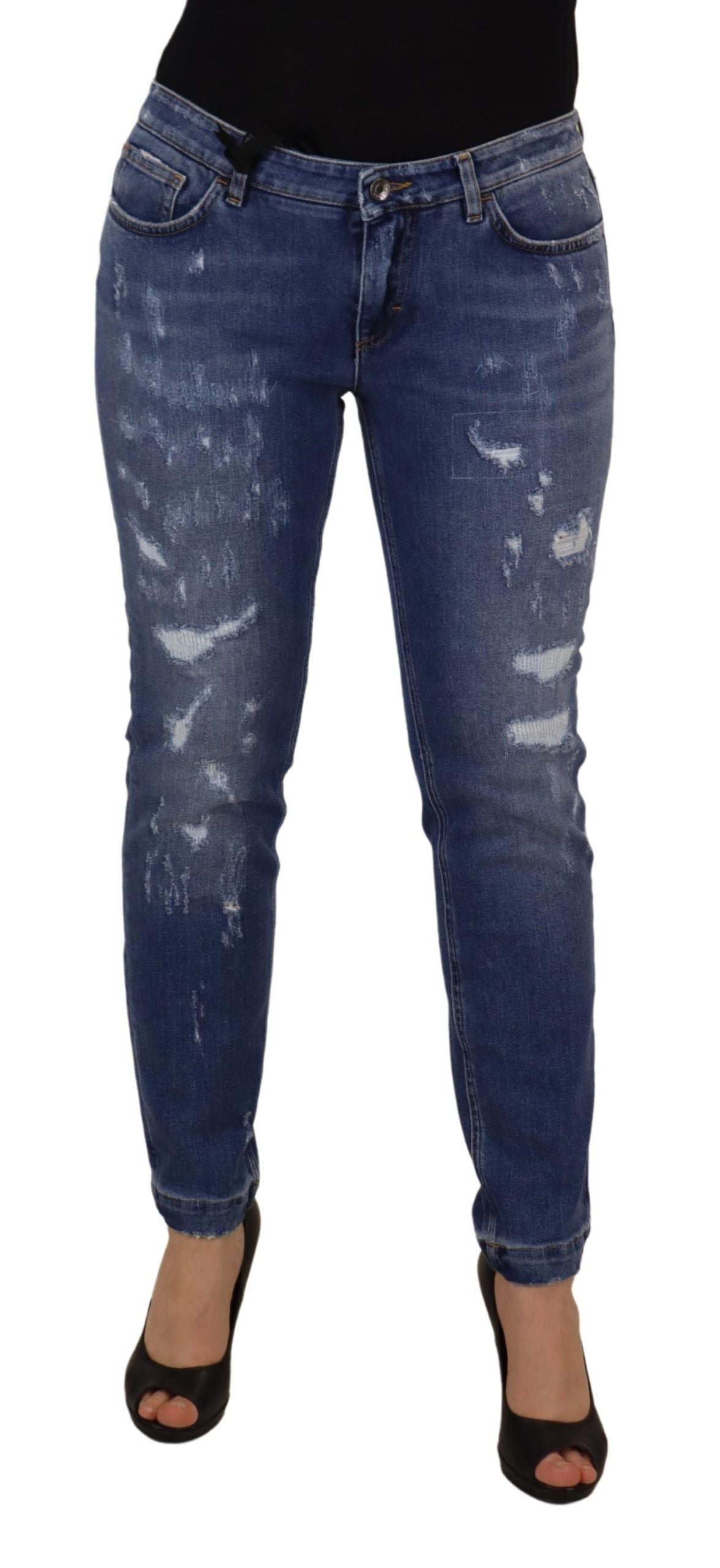Blue washed cotton skinny low waist denim jeans by Dolce & Gabbana, shown with a close-up of the fitted design and classic denim texture.