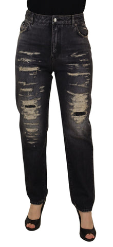 Black washed tattered high waist denim jeans by Dolce & Gabbana, shown with distressed details and a high-rise fit.