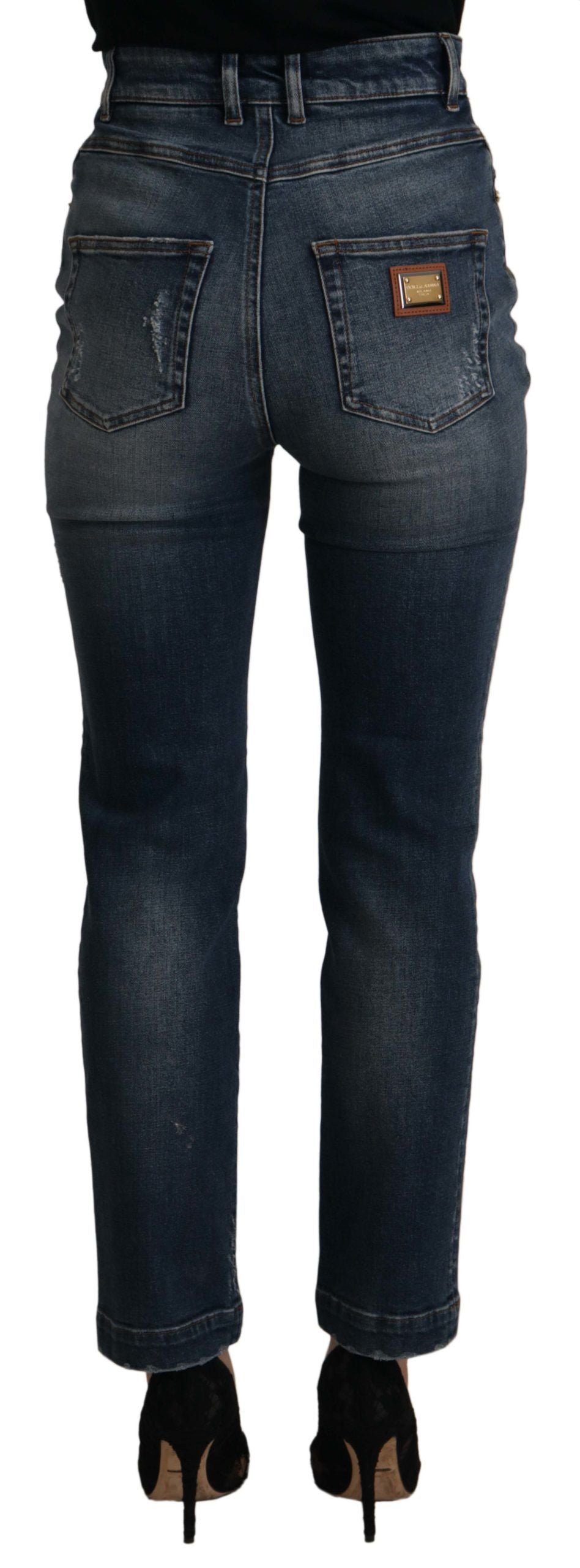 Blue denim crystal-embellished pants by Dolce & Gabbana, stylish jeans with decorative crystal details and classic fit.