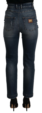 Blue denim crystal-embellished pants by Dolce & Gabbana, stylish jeans with decorative crystal details and classic fit.