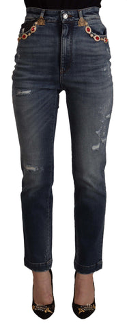 Blue denim pants with crystal embellishments from Dolce & Gabbana, featuring a fitted style and classic jean details.