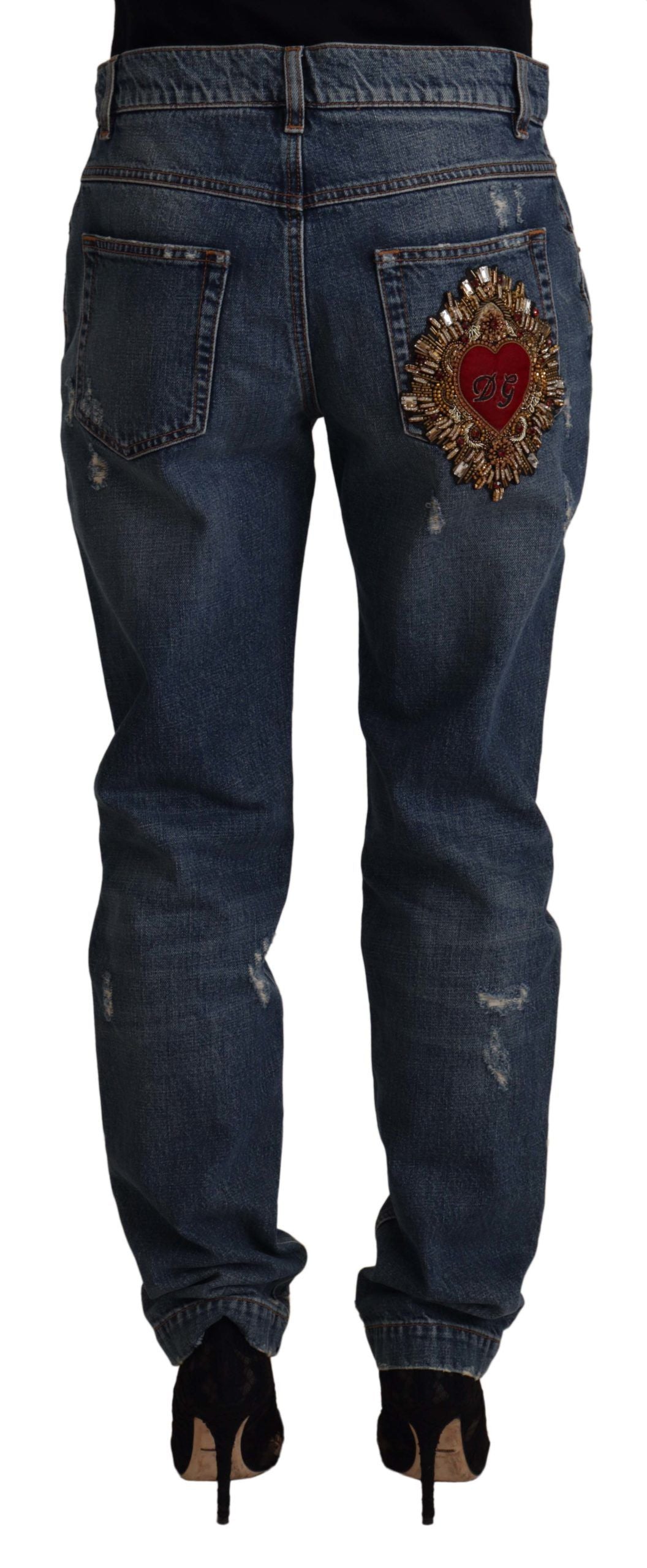 Blue denim jeans with Baroque heart logo patch from Dolce & Gabbana, featuring stylish design and classic fit.