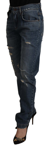 Blue denim jeans by Dolce & Gabbana featuring a baroque heart logo patch on the front.
