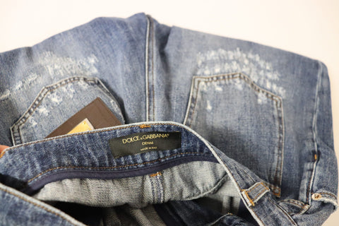 Blue washed high waist loose fit pants by Dolce & Gabbana, shown in a relaxed fit style with a casual, stylish look.