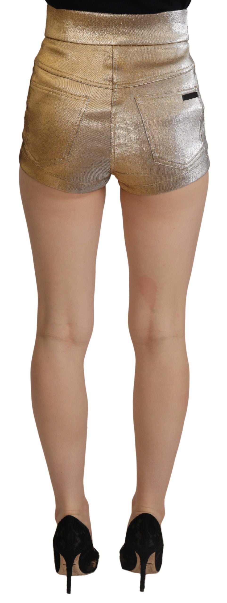 Gold cotton blend glittered hot shorts by Dolce & Gabbana, featuring a shiny, stylish design with a comfortable fit.