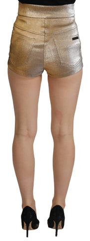 Gold cotton blend glittered hot shorts by Dolce & Gabbana, featuring a shiny, stylish design with a comfortable fit.