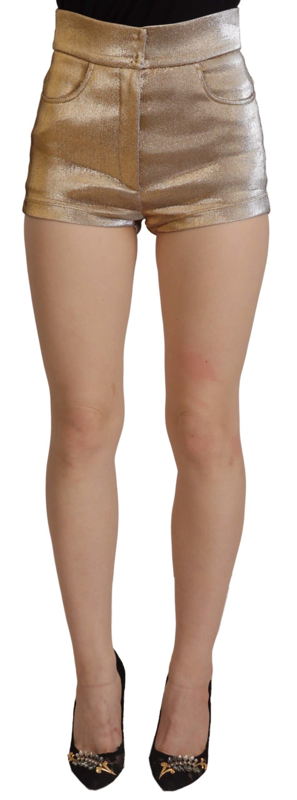 Gold cotton blend glittered hot shorts by Dolce & Gabbana, featuring shiny fabric and a fitted style for bold summer wear.