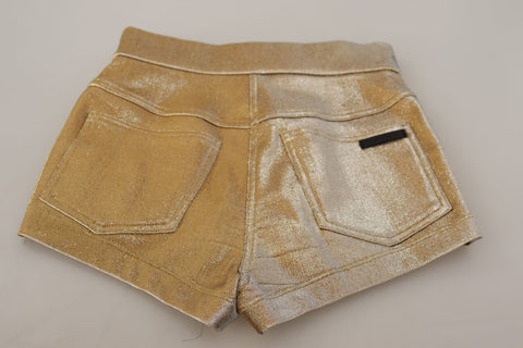 Gold cotton blend glittered hot shorts by Dolce & Gabbana, featuring a shiny, stylish design perfect for trendy summer outfits.