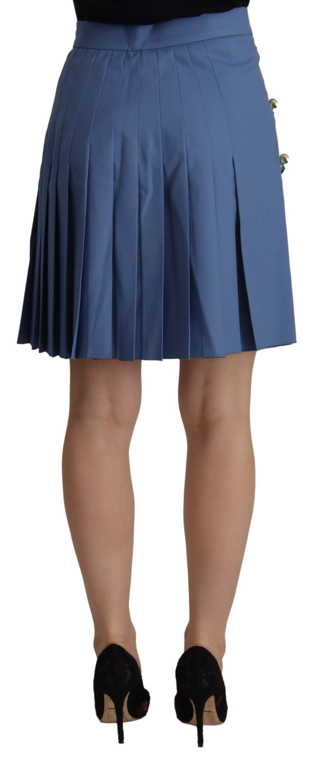Blue embellished pleated mini wool skirt by Dolce & Gabbana, featuring intricate embellishments and a stylish, fitted design.