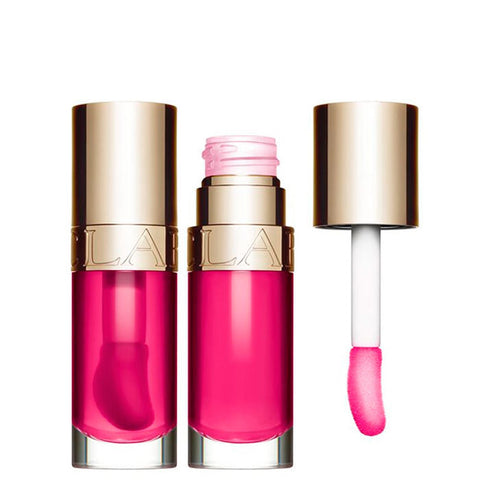 Clarins Lip Comfort Oil 02 Raspberry in a 7ml bottle, featuring a glossy lip oil with raspberry flavor, displayed on a neutral background.