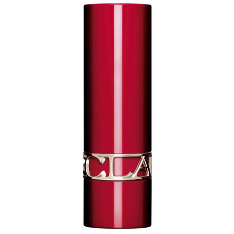 Jag Couture London New York Clarins Joli Rouge L'Écrin Red lipstick in a sleek red tube, displayed on a neutral background