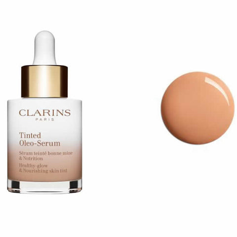 Clarins Tinted Oleo-Serum 02.5 in 30ml bottle, skincare product with tinted oil-serum texture displayed against a neutral background.
