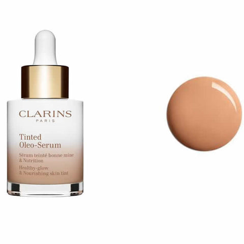Clarins Tinted Oleo-Serum 03 in 30ml bottle, featuring a sleek design, showcasing the luxurious skincare product from Jag Couture London.