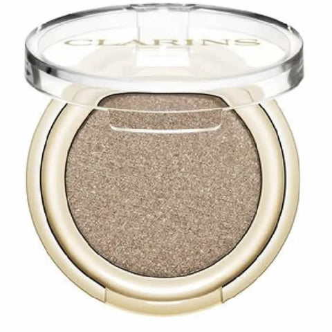 Jag Couture London New York Clarins Ombre Skin 03 Pearly Gold eyeshadow with shimmering gold finish, compact packaging.