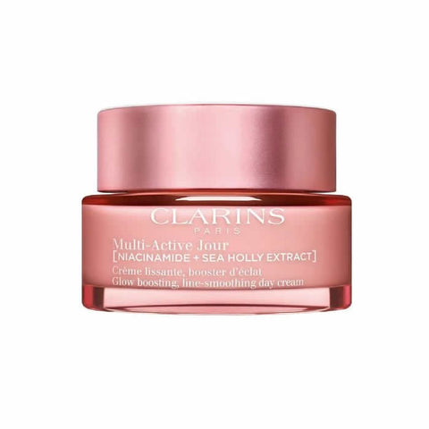 Jar of Clarins Multi-Active Day Cream for dry skin, 50ml, with smooth cream texture and skincare label, by Jag Couture London - New York