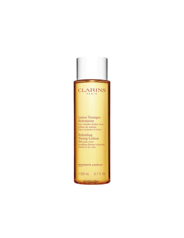 Clarins Hydrating Tonic Lotion for Dry and Normal Skin, 200ml, with natural ingredients in a clear bottle.