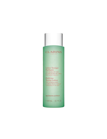 Clarins purifying toner for oily and combination skin in 200ml bottle, with natural ingredients, on a white background.