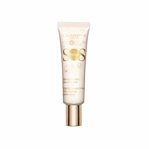 Jag Couture London New York Clarins SOS Primer Base Golden Glow Limited Edition 2024, close-up of the primer tube with golden accents.