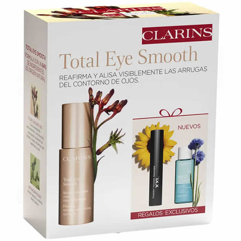 Set of three Clarins Total Eye Smooth 15ml eye creams in sleek jars, designed to reduce puffiness and dark circles.