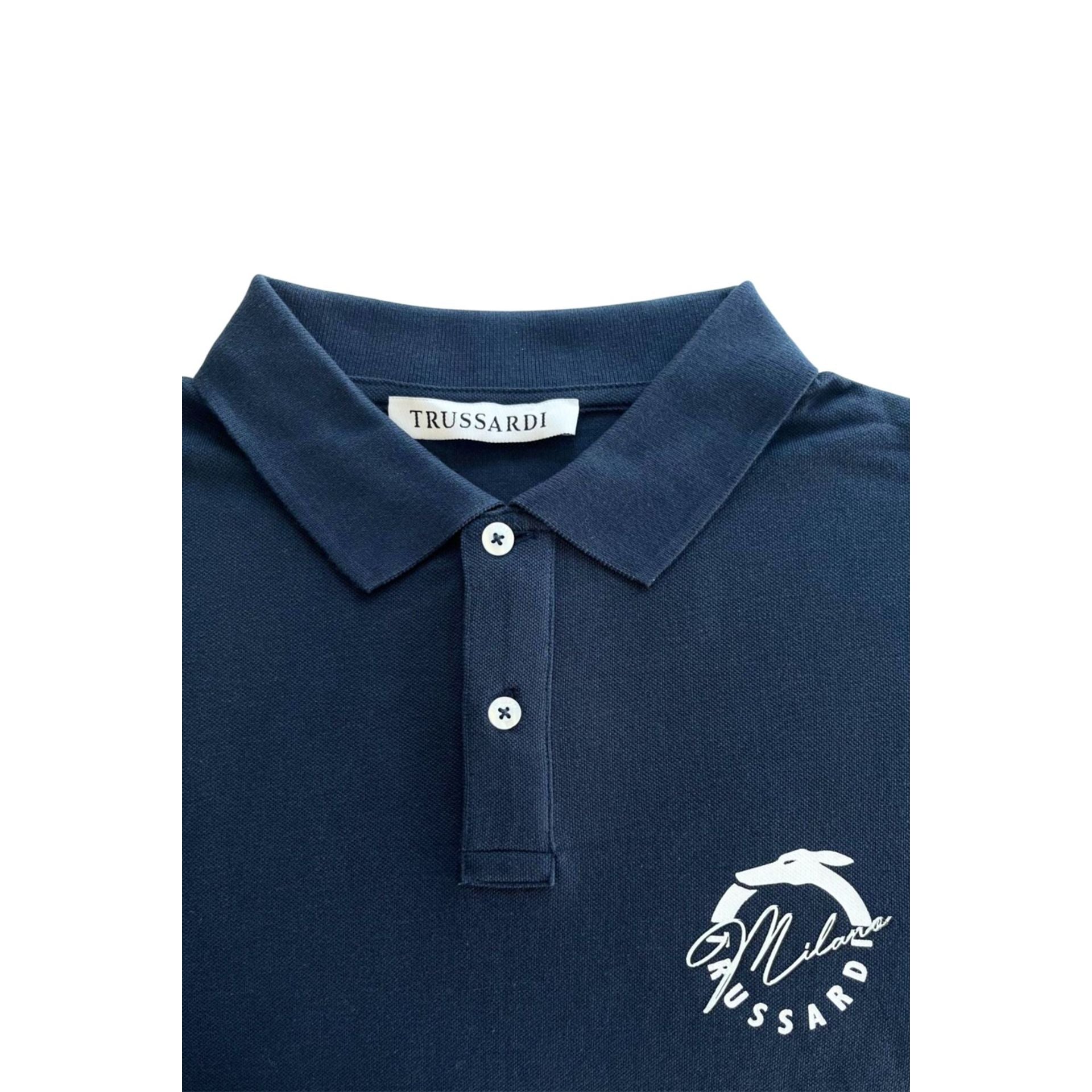Navy Trussardi Beachwear TRU25MPL01 featuring stylish design, displayed on a model with a beach background