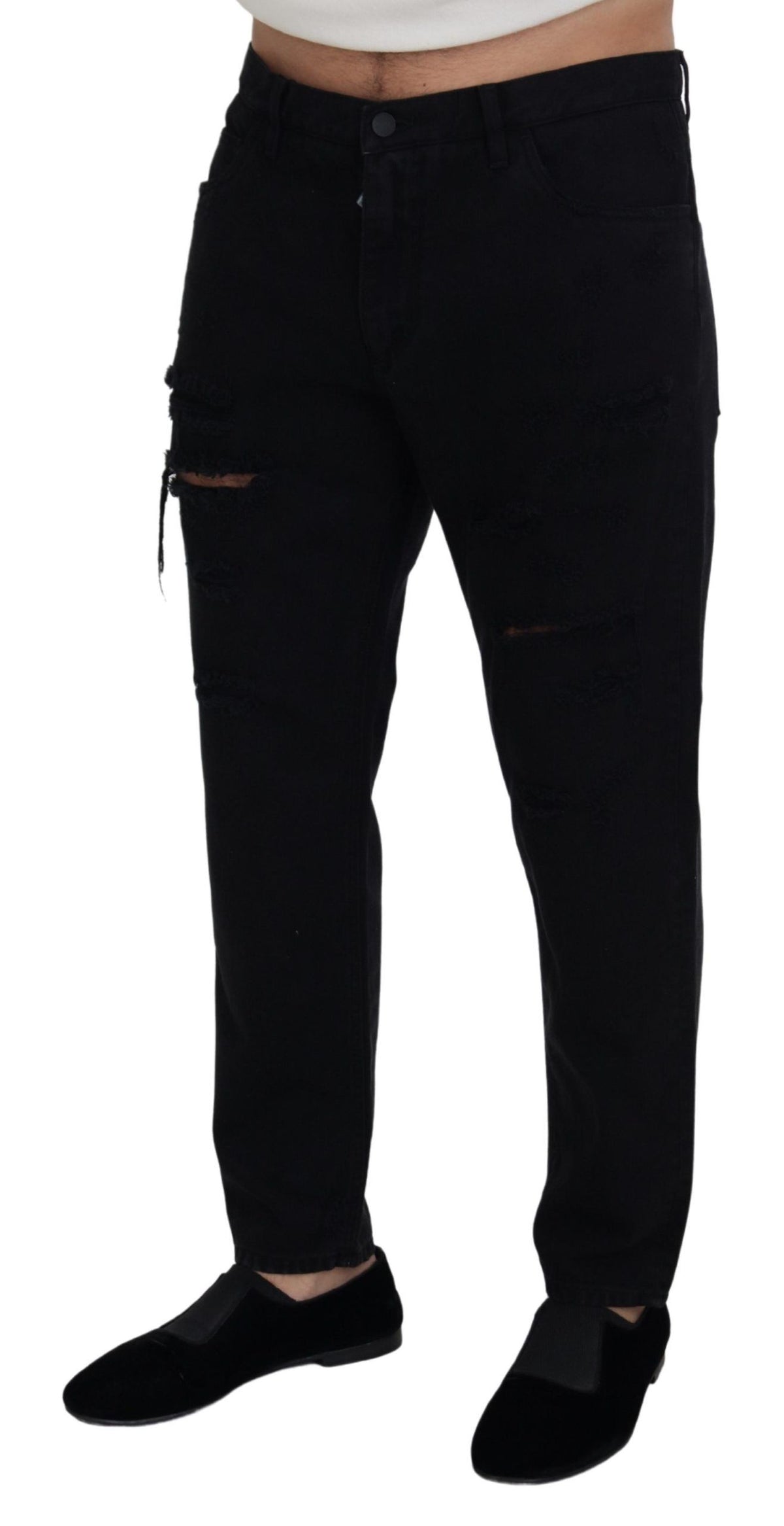 Black loose regular-fit torn cotton jeans by Dolce & Gabbana, showcasing distressed details and classic denim style.