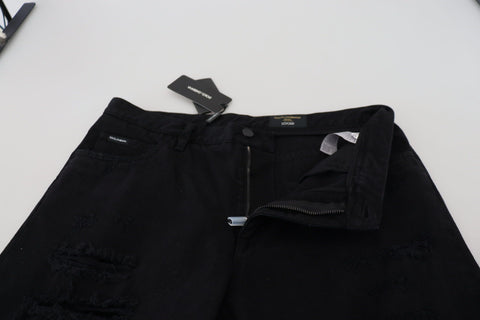Black loose regular fit torn cotton jeans by Dolce & Gabbana showing distressed details and relaxed style.