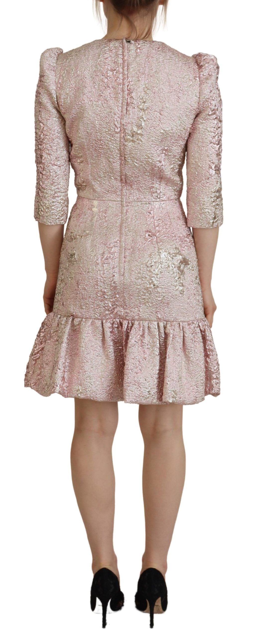 Pink jacquard 3/4 sleeve sheath midi dress by Dolce & Gabbana featuring a fitted silhouette and elegant design.