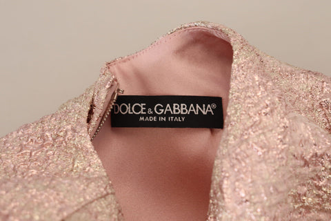 Pink jacquard 3/4 sleeve sheath midi dress by Dolce & Gabbana displayed on a hanger.