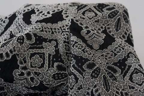 Black and gray jacquard sheath bodycon dress by Dolce & Gabbana, fitted design with intricate textured pattern.