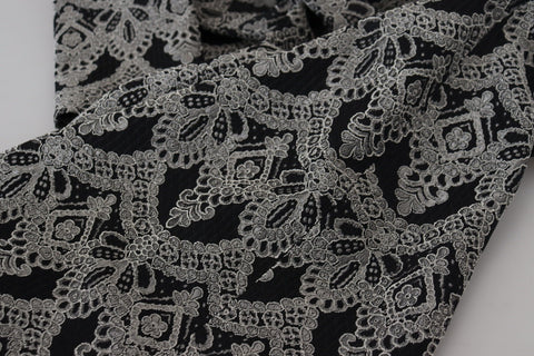 Black and gray jacquard sheath bodycon dress by Dolce & Gabbana, fitted design with intricate pattern and elegant style.