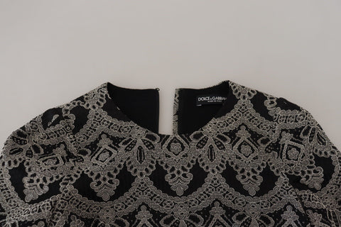 Black and gray jacquard sheath bodycon dress by Dolce & Gabbana, featuring a fitted silhouette and intricate pattern.