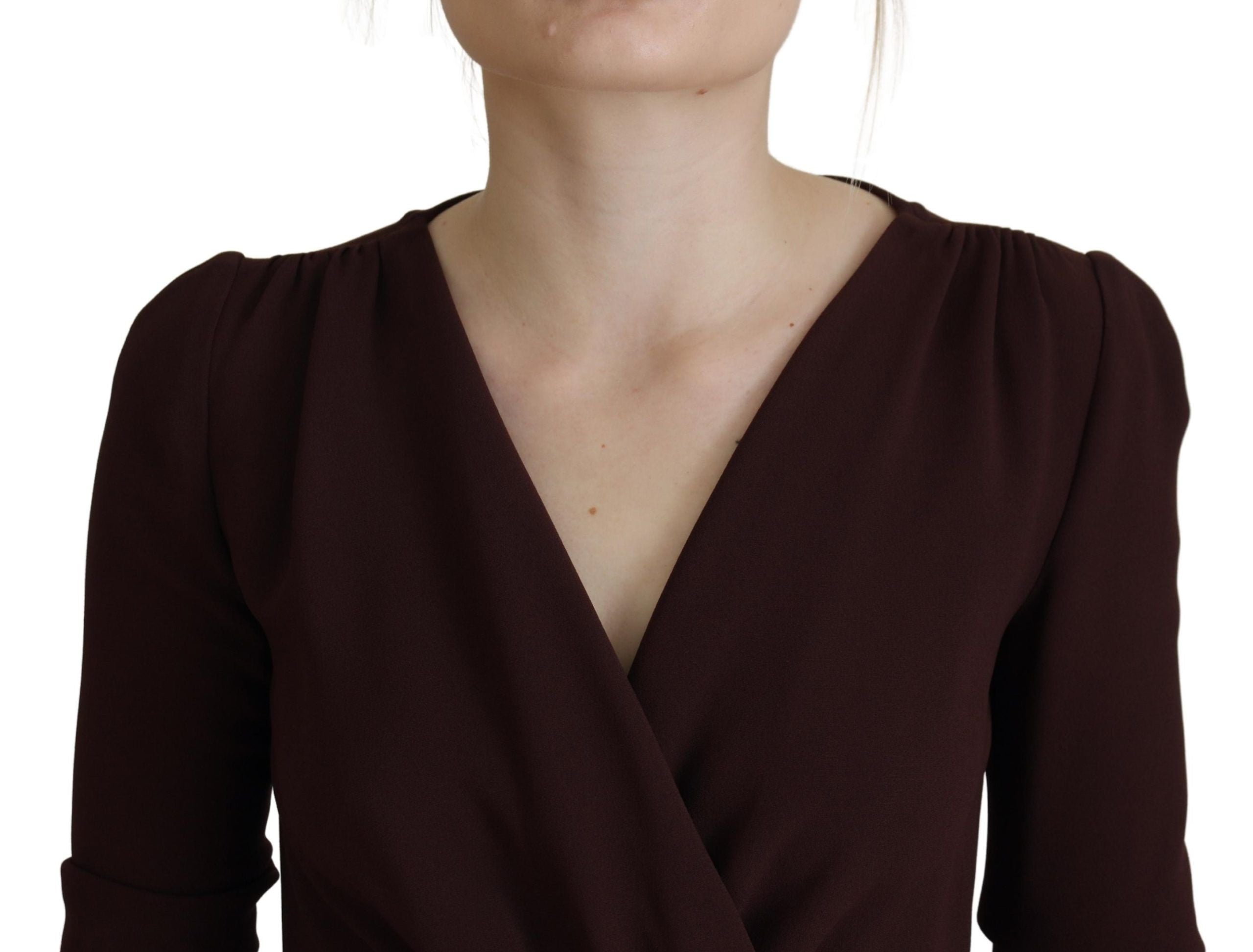 Brown wrap long sleeve midi stretch dress by Dolce & Gabbana shown on a model, featuring a fitted silhouette and elegant design.