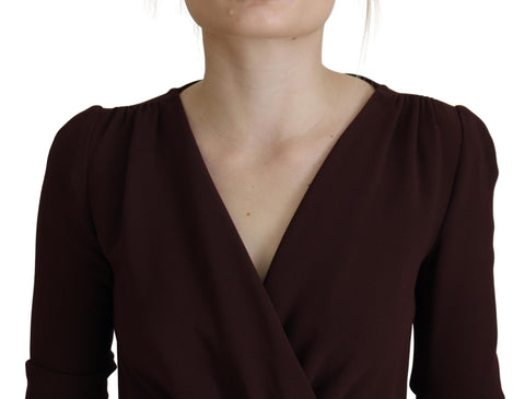 Brown wrap long sleeve midi stretch dress by Dolce & Gabbana shown on a model, featuring a fitted silhouette and elegant design.