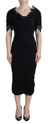 Black sheath midi bodycon lace silk dress by Dolce & Gabbana, featuring a fitted silhouette and intricate lace detailing.