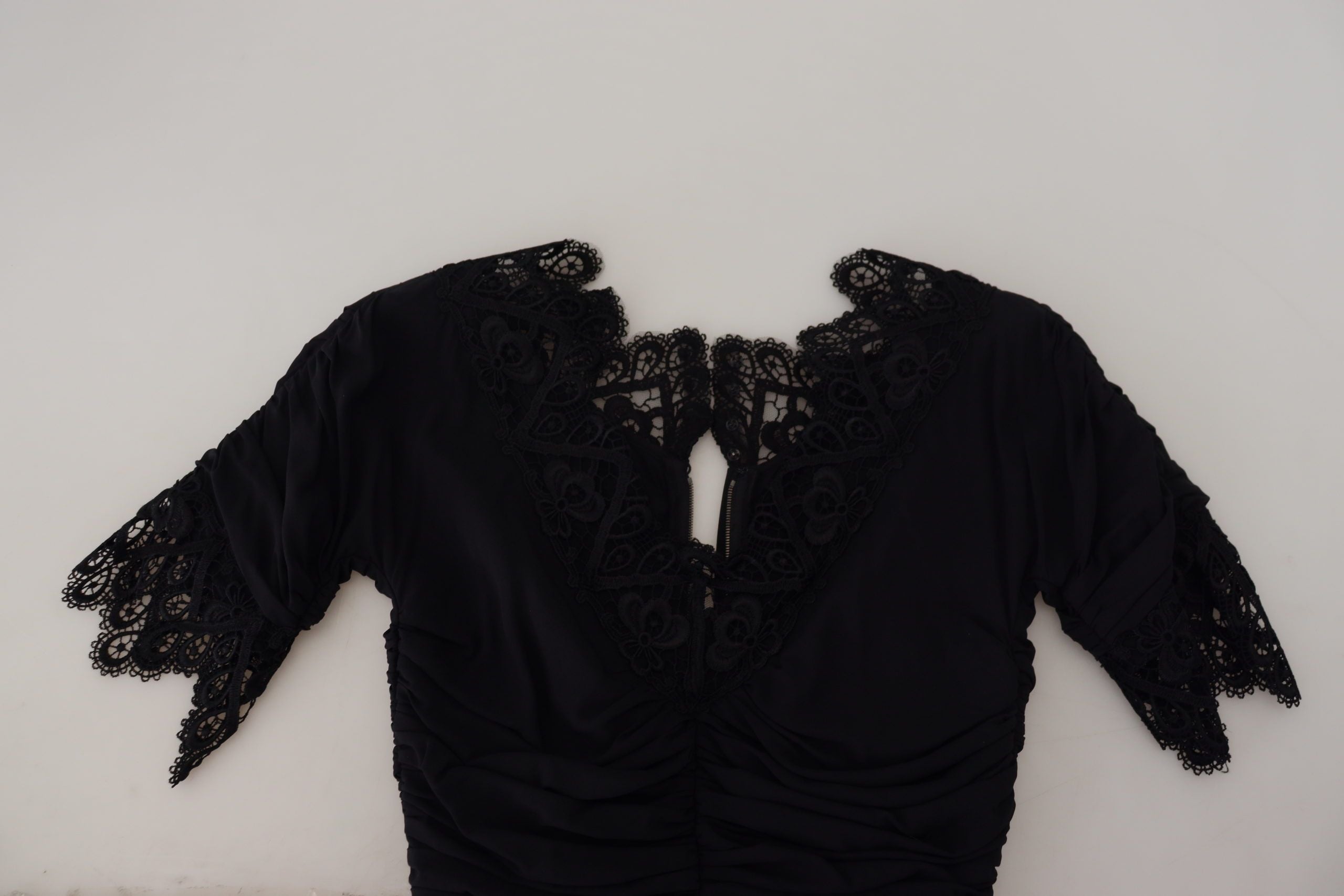 Black sheath midi bodycon lace silk dress by Dolce & Gabbana, showcasing a fitted silhouette with intricate lace detailing.