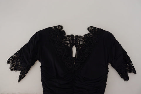 Black sheath midi bodycon lace silk dress by Dolce & Gabbana, showcasing a fitted silhouette with intricate lace detailing.
